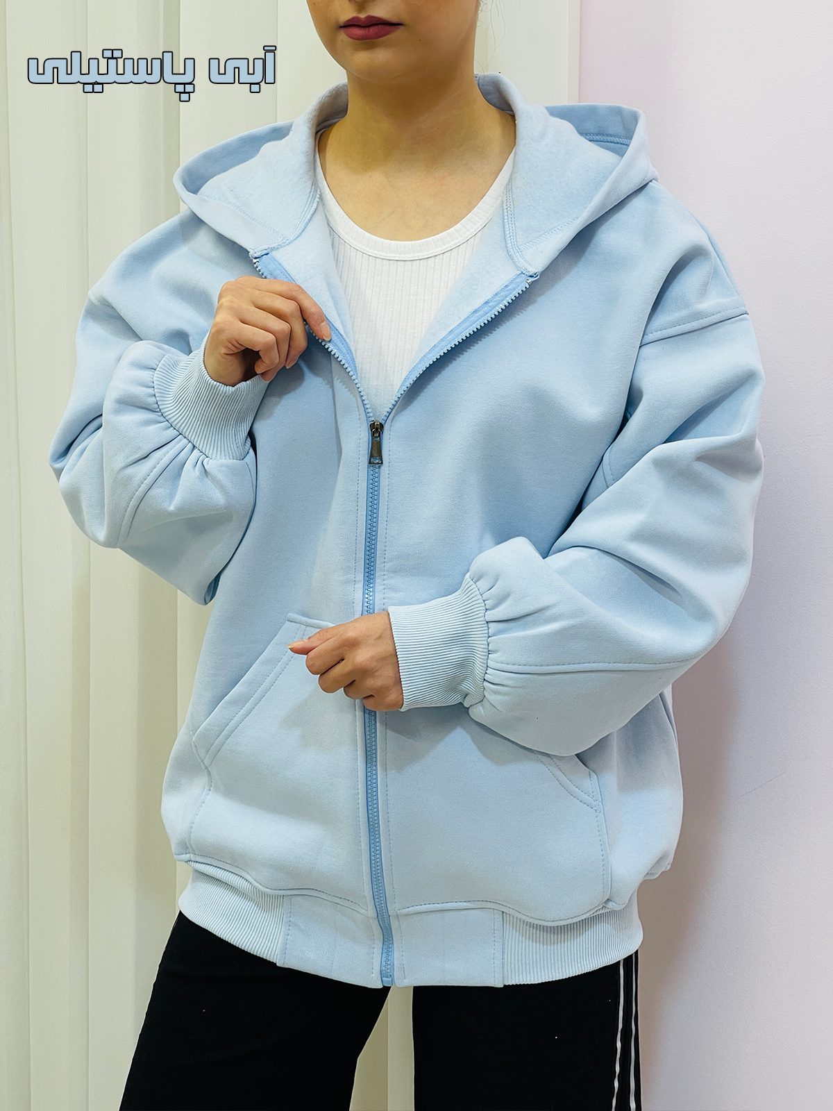 سویشرت کلاهدار دورس قواره دار زنانه سویشرت کلاهدار دورس قواره دار زنانه