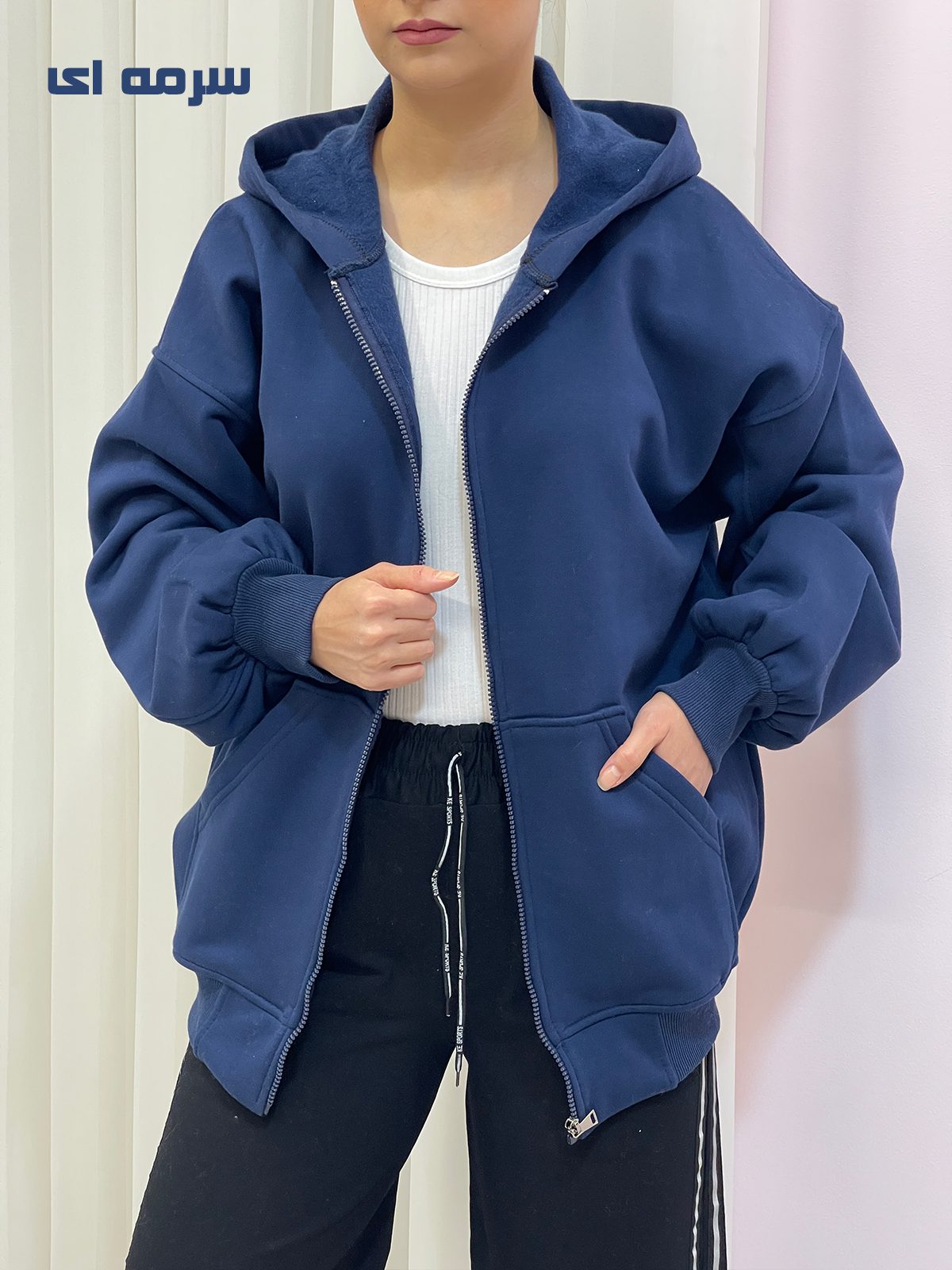 سویشرت کلاهدار دورس قواره دار زنانه سویشرت کلاهدار دورس قواره دار زنانه