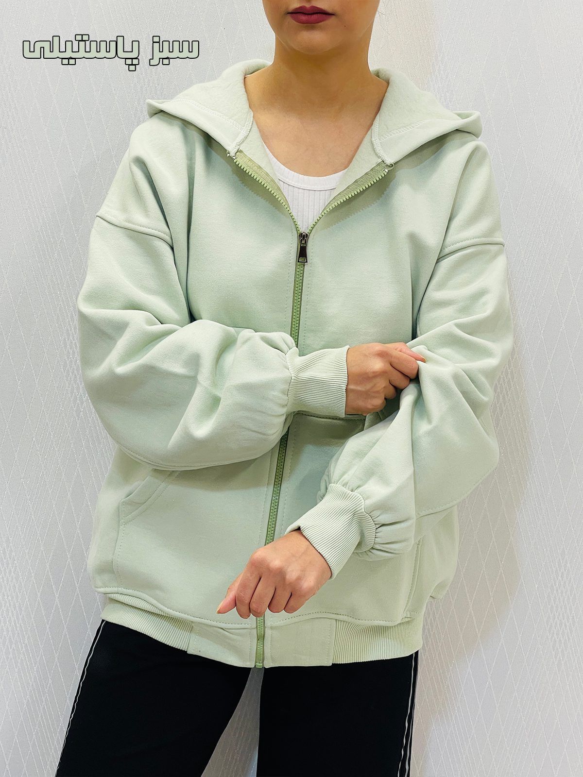 سویشرت کلاهدار دورس قواره دار زنانه سویشرت کلاهدار دورس قواره دار زنانه