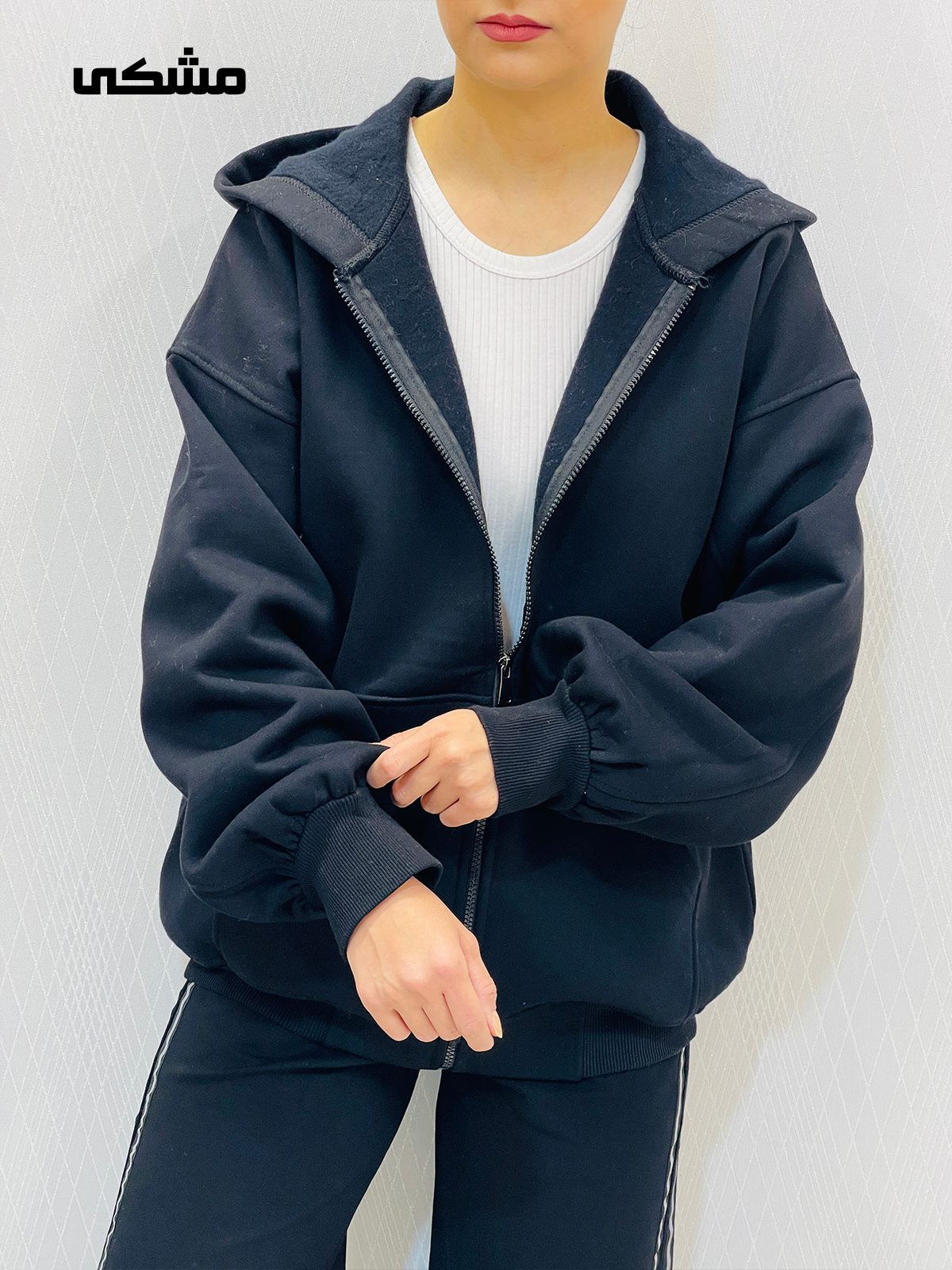 سویشرت کلاهدار دورس قواره دار زنانه سویشرت کلاهدار دورس قواره دار زنانه